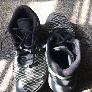 Green and black Kevin Durant’s basketball shoes